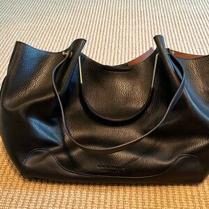 Sondra Robert’s black tote bag